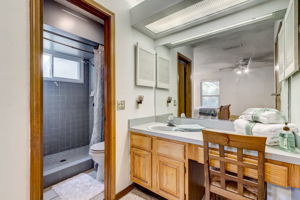 The master bath features a sit-down make-up area ...