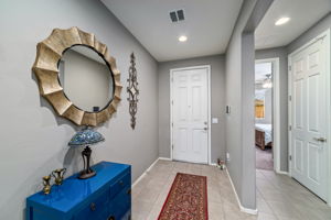Foyer view to front door/bedroom 2 to right