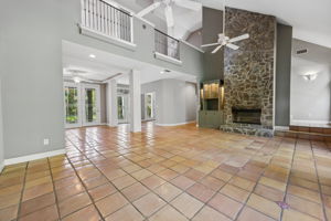 Soaring Floor-to-Ceiling Stone Fireplace