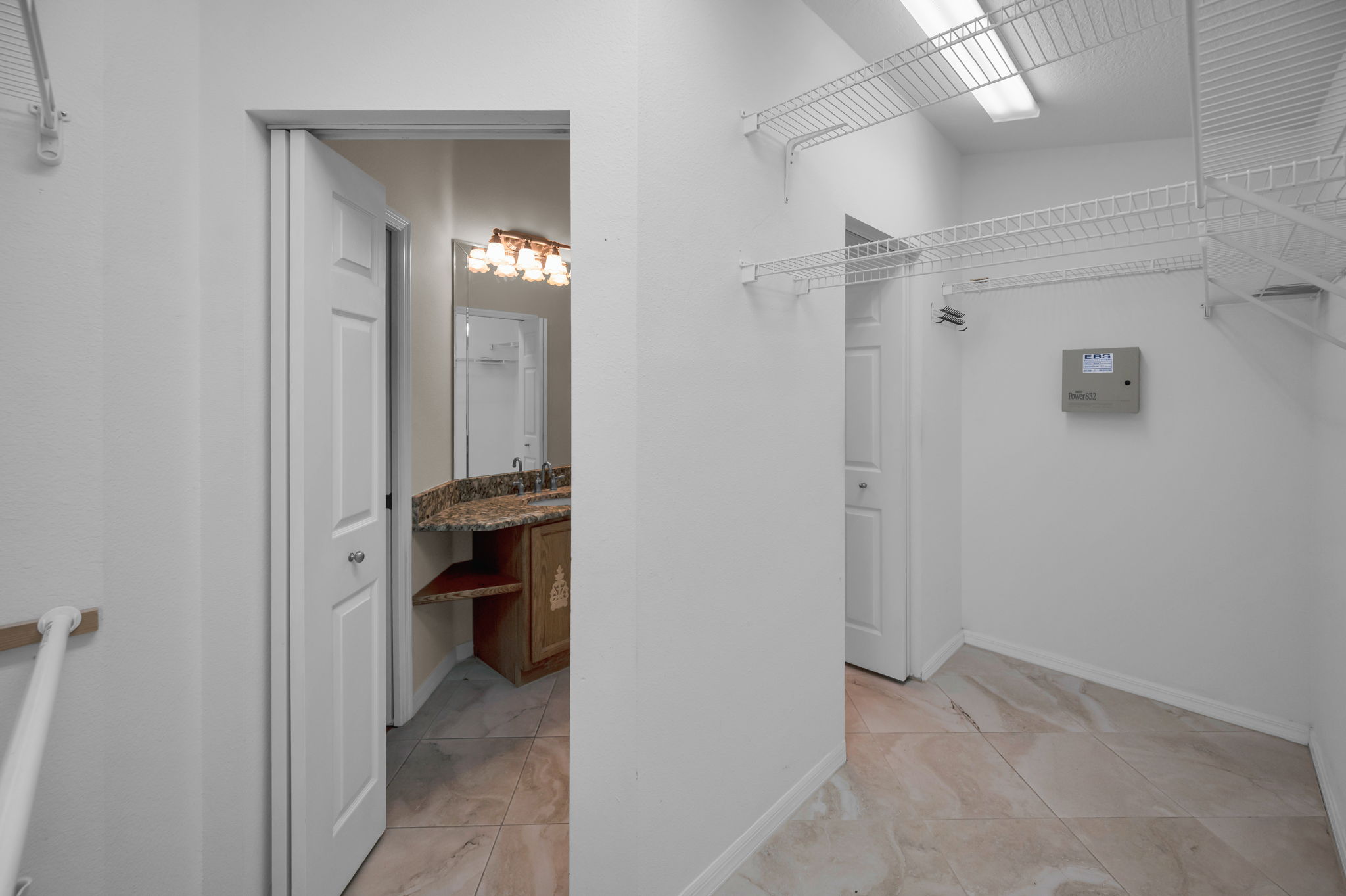 Primary Bedroom Walk-in Closet1a