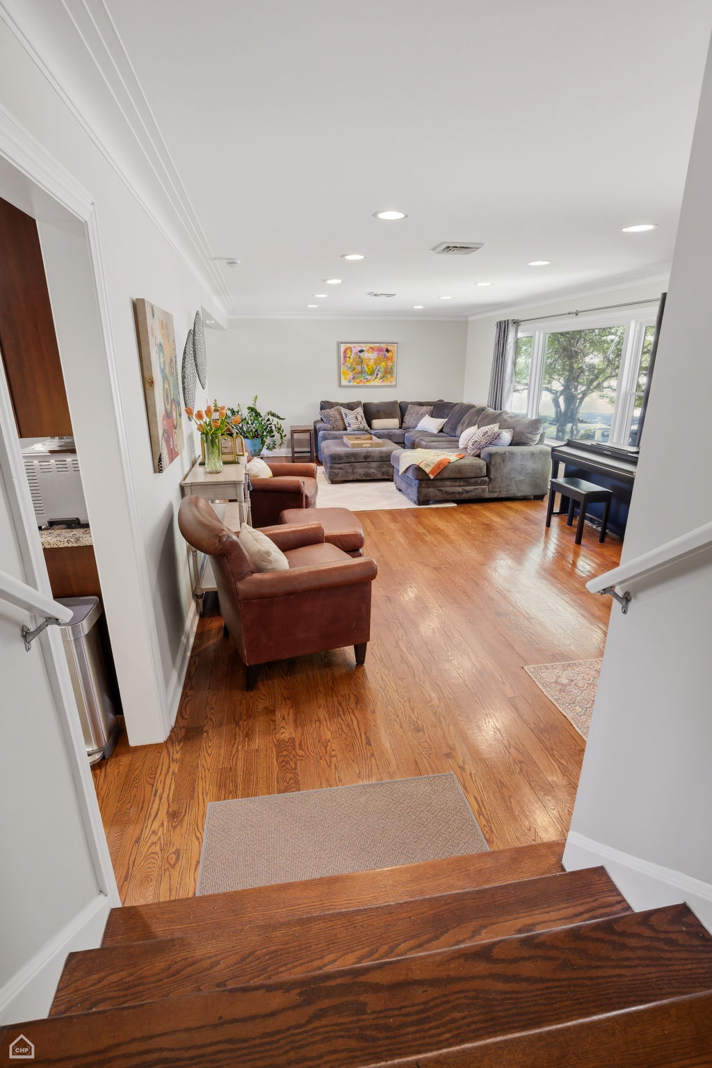 Wide stairway takes you to second floor, 3 bedrooms and a full bath