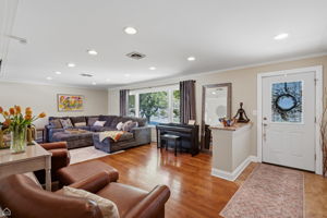 Living room, welcoming front entrance