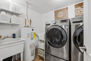 Laundry room, basement also has large storage room