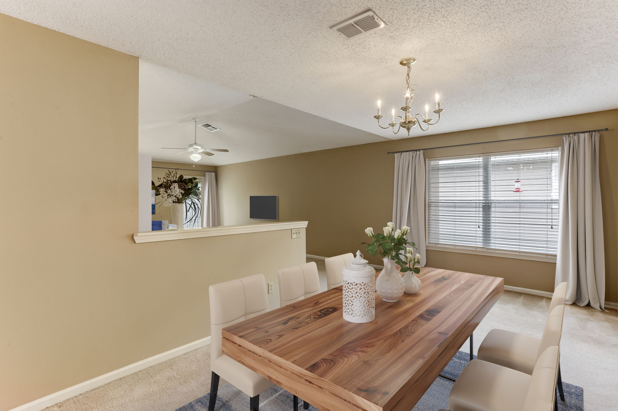 Dining open to kitchen/living