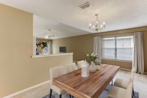 Dining open to kitchen/living