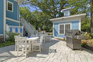 Patio with gas grill and seating for eight