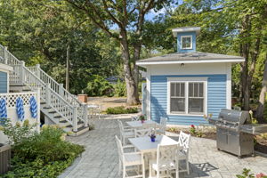 Patio with gas grill and seating for eight