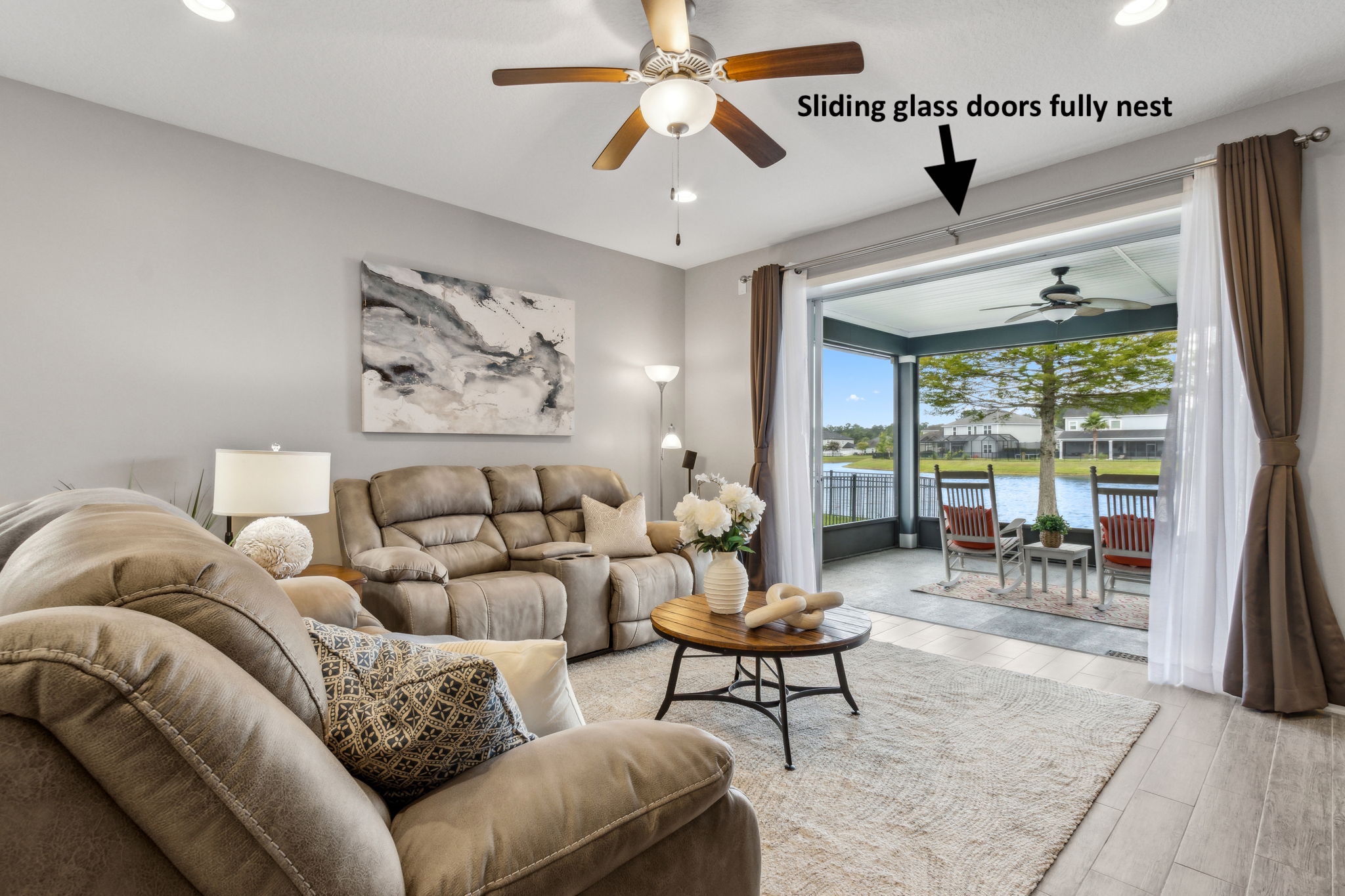 ... bathed in natural light from triple sliders that completely nest!