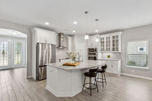 The kitchen is bright and cheery ...