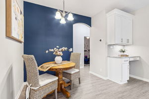 ... providing another dining option with views of the family room and lake beyond.