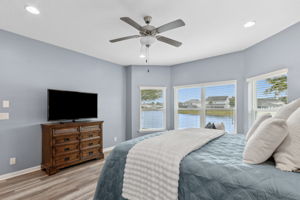 ... with a wall of bay windows providing panoramic views of the lake.