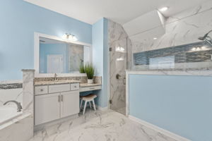 ... and a massive floor-to-ceiling tiled shower...