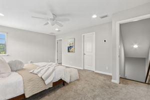 Oversized, it offers room for bed, living furniture and desk, if so desired.