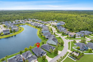 ...facing the lake in the back and a large expanse of community green space in the front.
