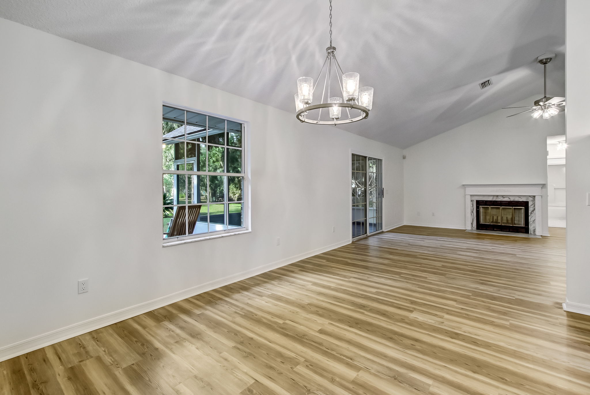 View of Dining Area/Great Room/Deck and Screen Porcch