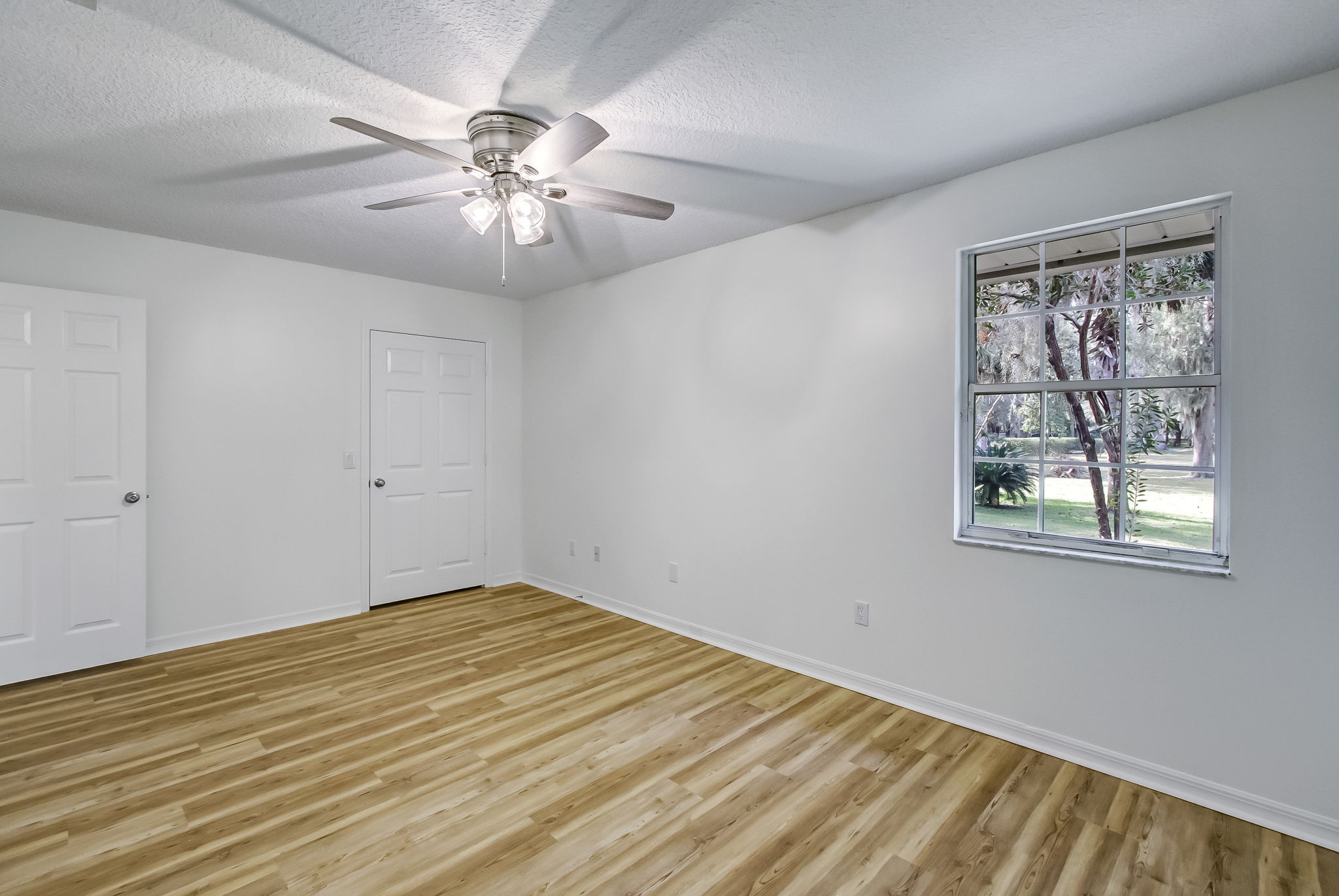 Bedroom 3 with view of front yard