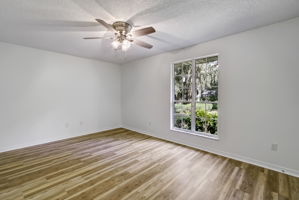 Bedroom 3 with view of front yard