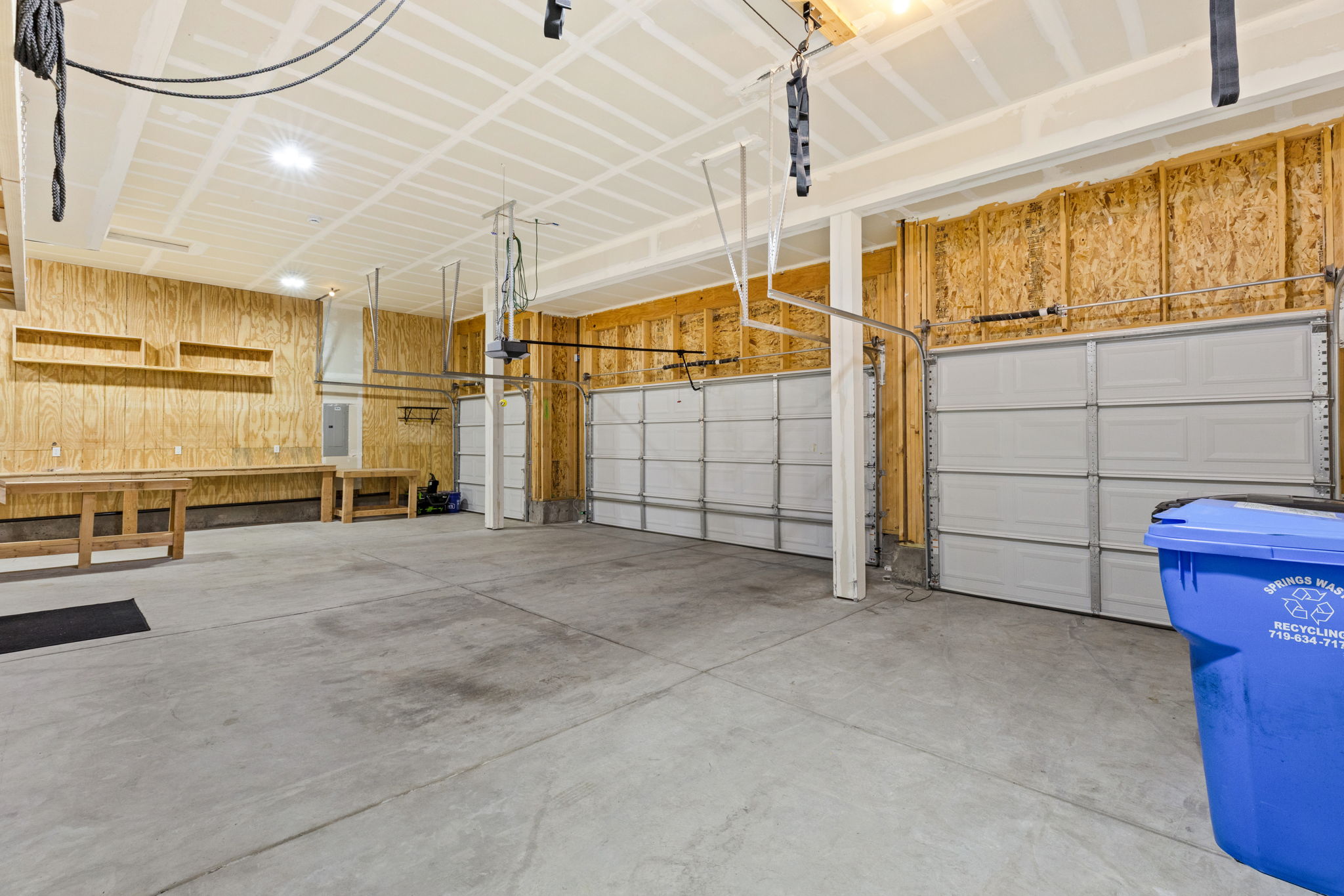 4-Car Garage with storage pully and work benches