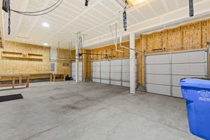 4-Car Garage with storage pully and work benches
