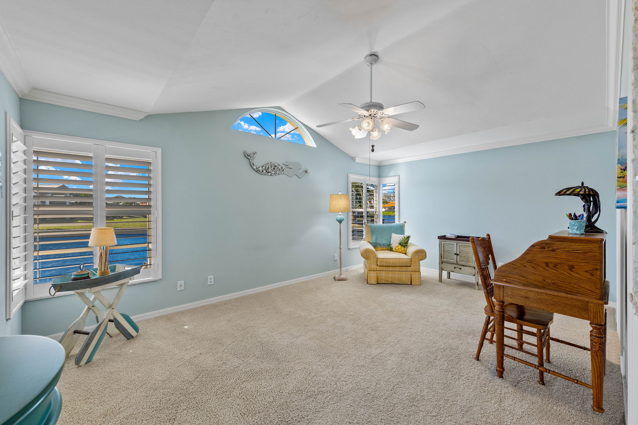 virtually staged- please remove the furniture that is in the room-Same beach theme as house