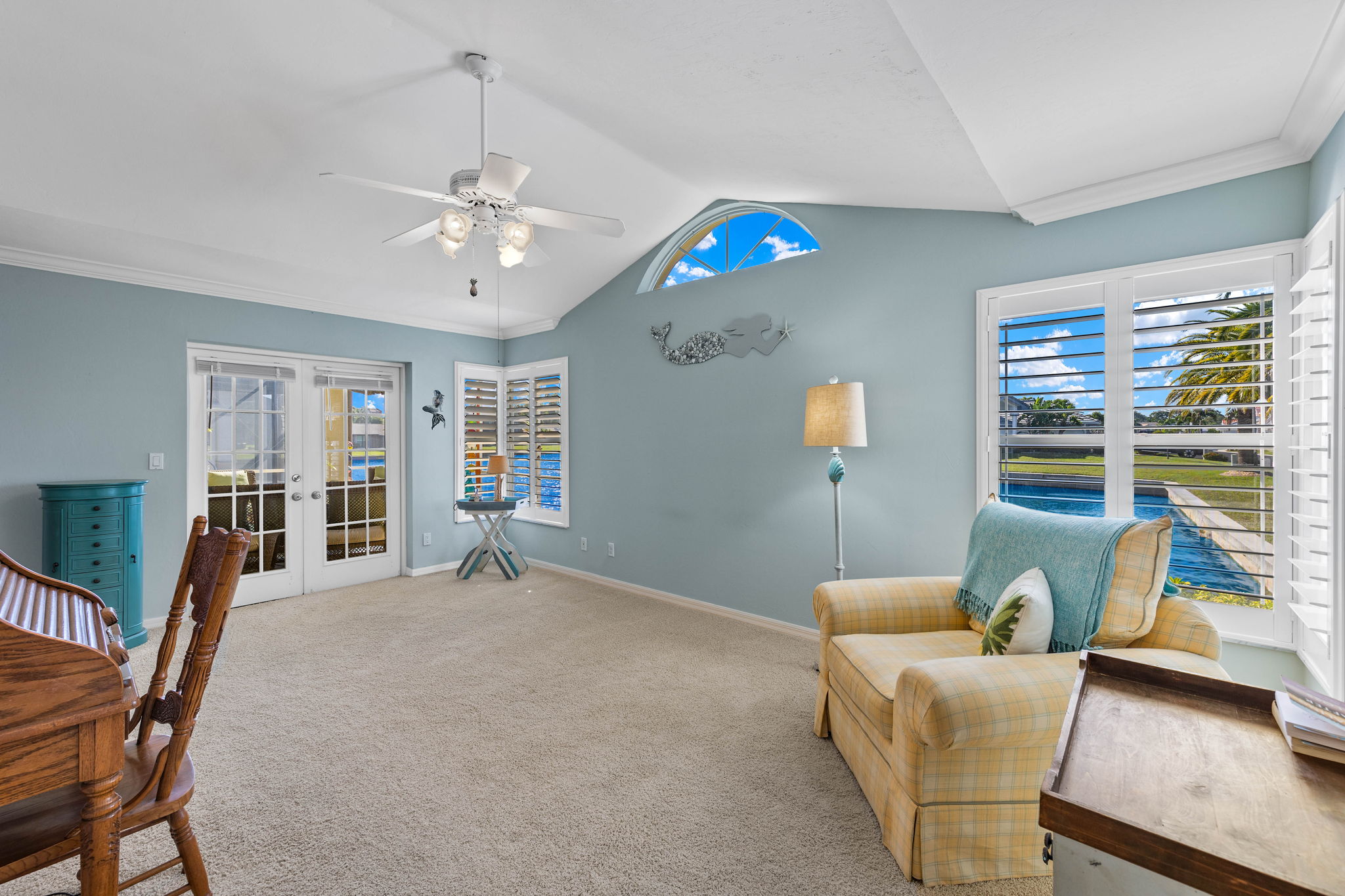 virtually staged- please remove furniture in the room-Same beach theme as house