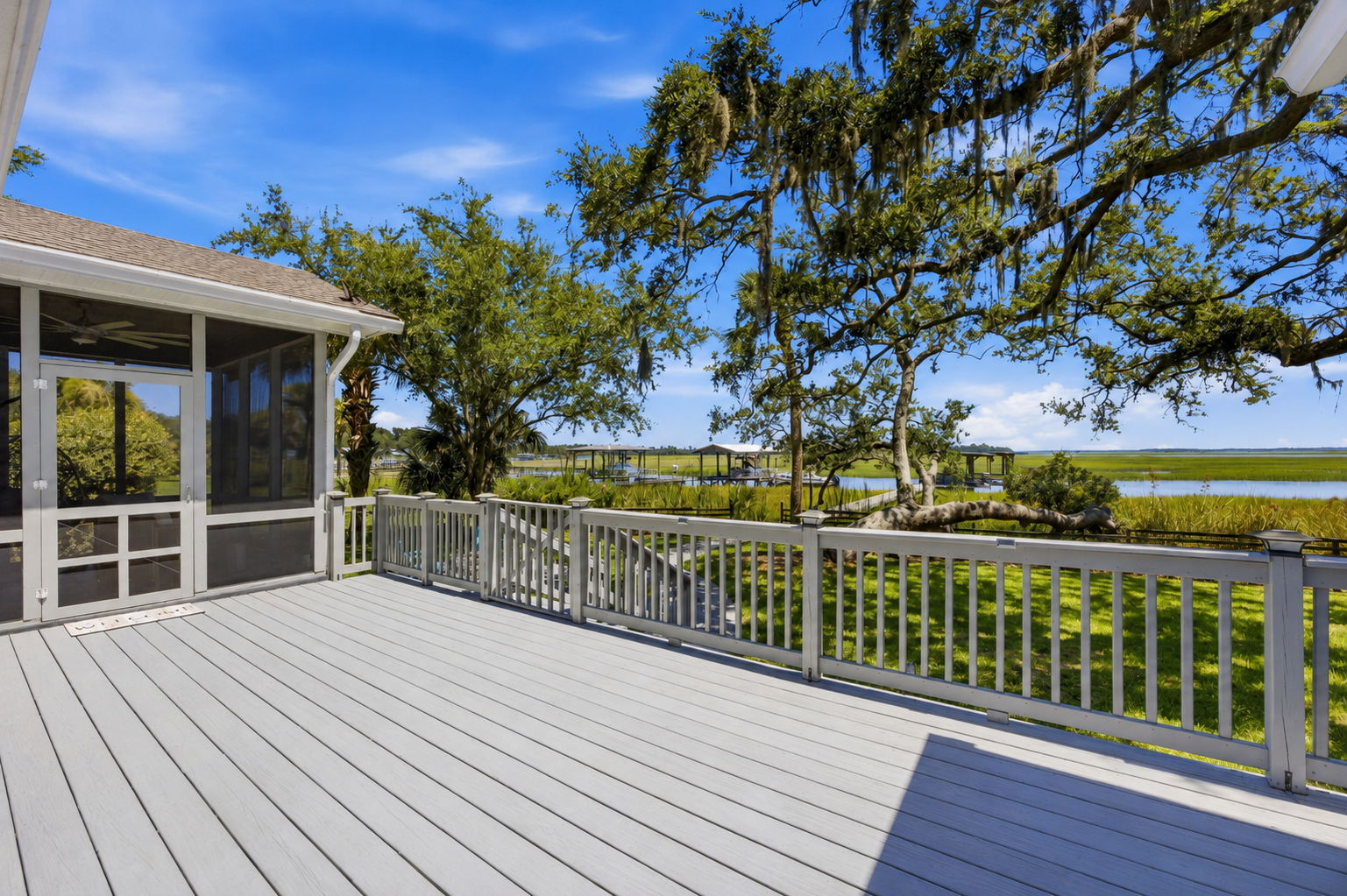 … while mature oaks and open water create a backdrop that feels both private and expansive