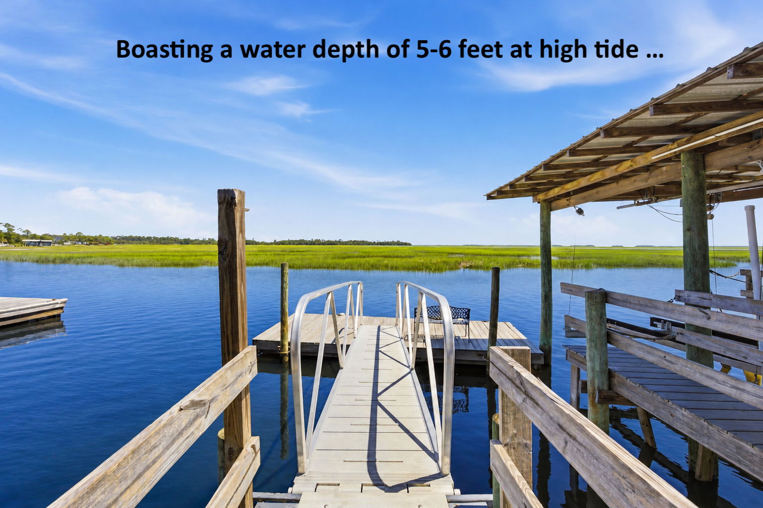 With approximately 5 to 6 feet of water at high tide, the dock supports easy access for a range of boats