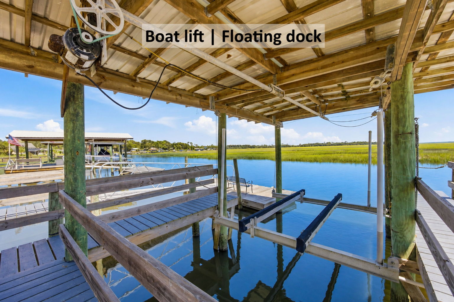 A boat lift and floating dock complete the setup, making it simple to launch, return and settle back into waterfront life