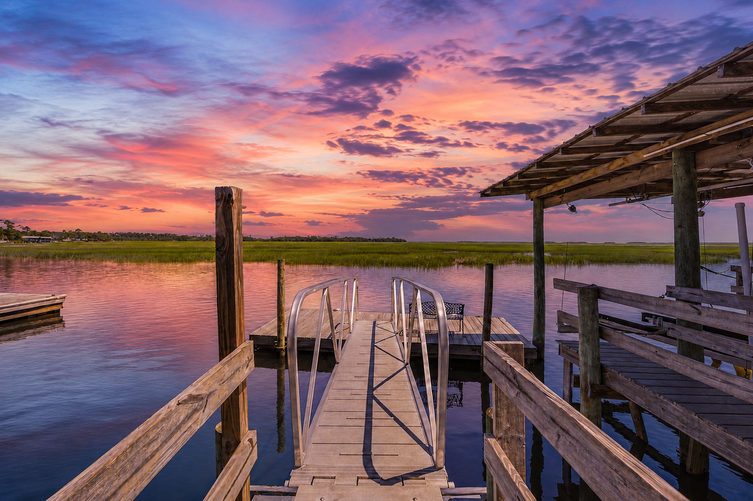 Back home, the dock becomes the perfect final scene as color settles across the marsh and water
