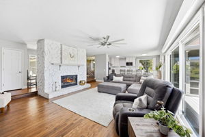 … while the home’s clean finishes allow the oak floors and natural setting to take center stage