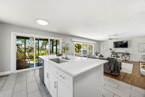 … where expansive glass frames the marsh and water, keeping the natural setting present throughout the day