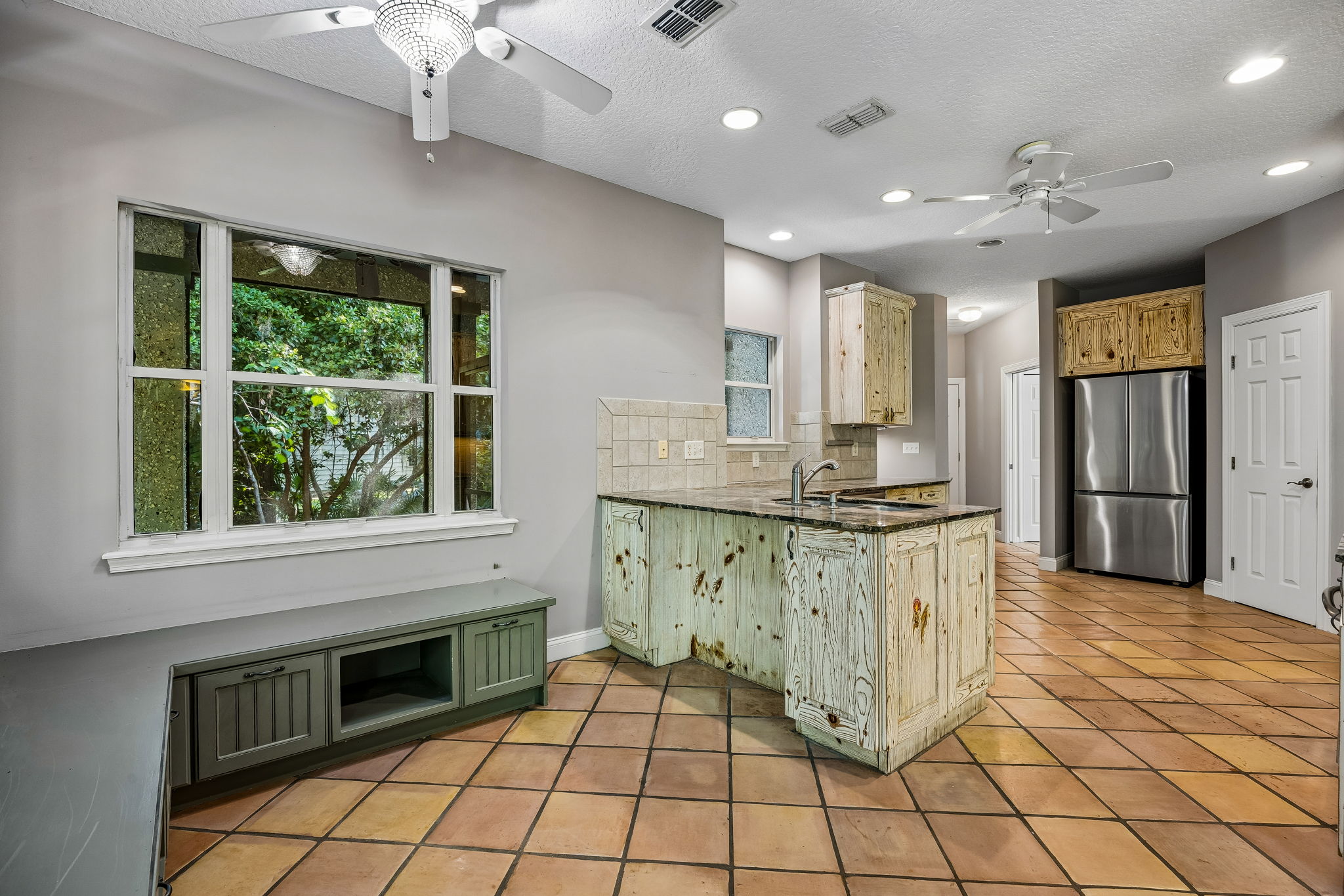 Kitchen and Dining Area with Banquette Seating