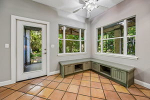 Kitchen Banquette Seating with access to wrap around screen porch