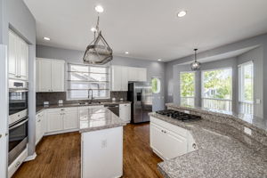 Spacious kitchen with plenty of cabinets & counter space