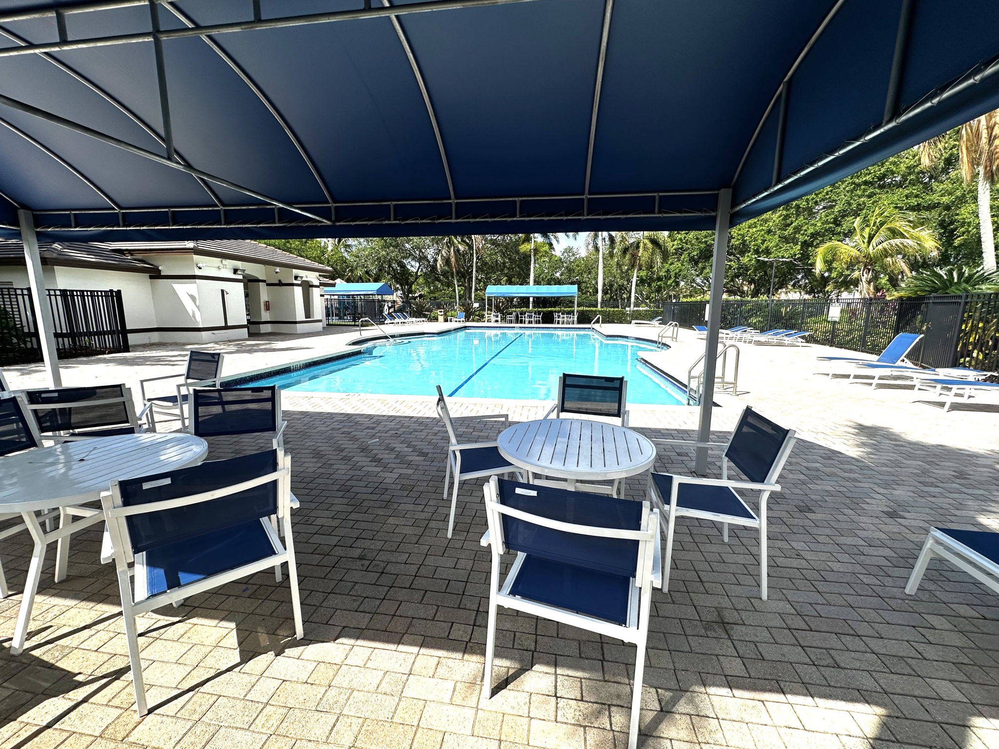 Community Pool with two canopied shady areas