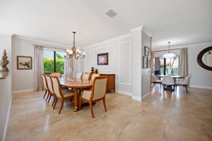Large Foraml Dining Room....crown molding...lots of natural sunlight