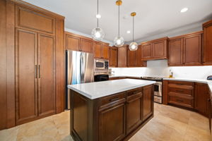 Large center island with lots of cabinet & drawer storage