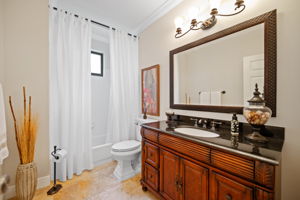 1st floor full bathroom adjacent to the big Bonus Room which can be a bedroom, office, den or nanny's room.