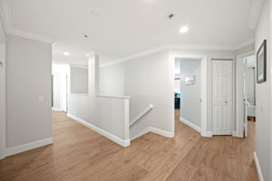 Spacious landing area on 2nd floor.  The same neutral, water resistant HDF flooring on staircase and all of 2nd floor (except the bathrooms)