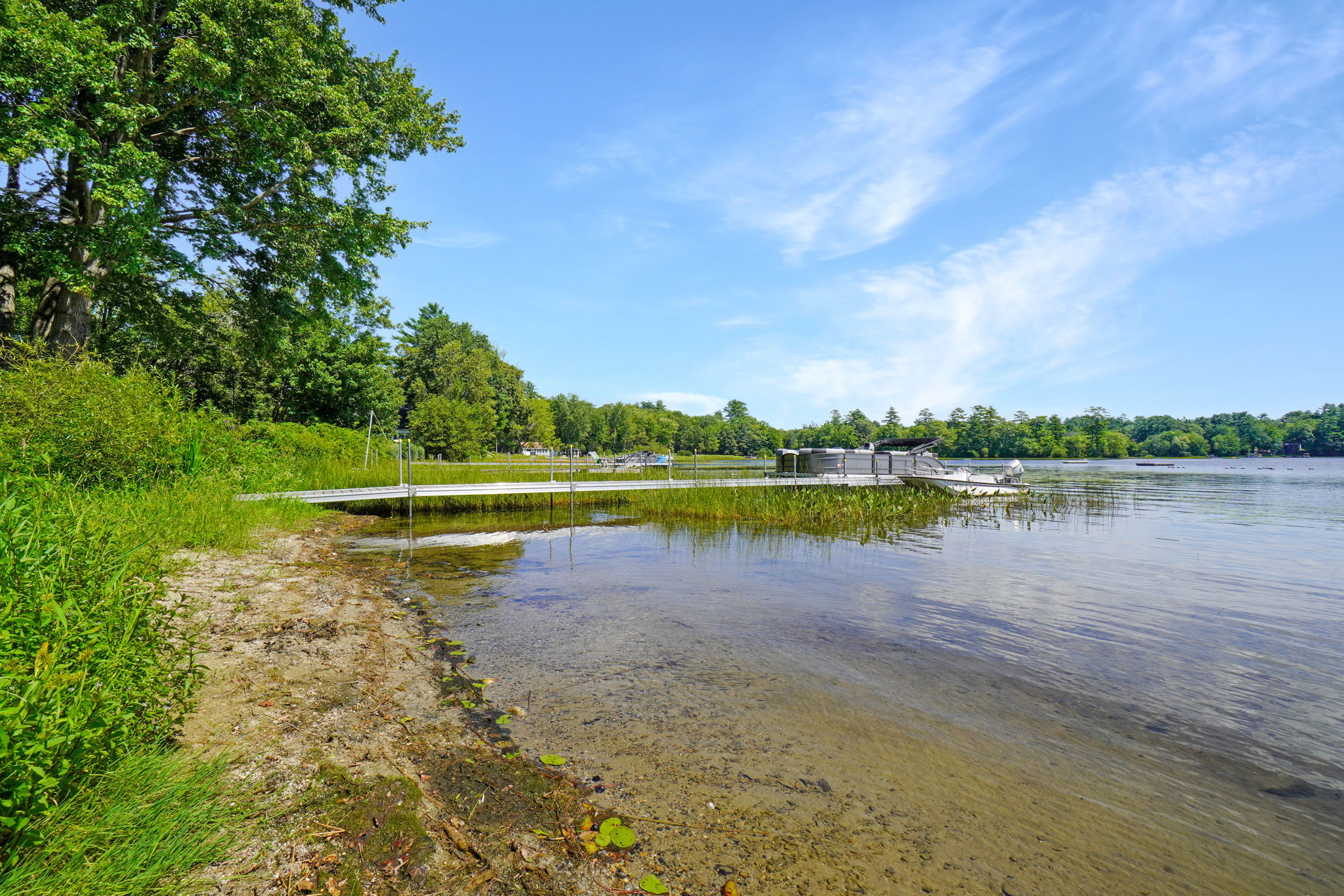 Private sandy beach and dock