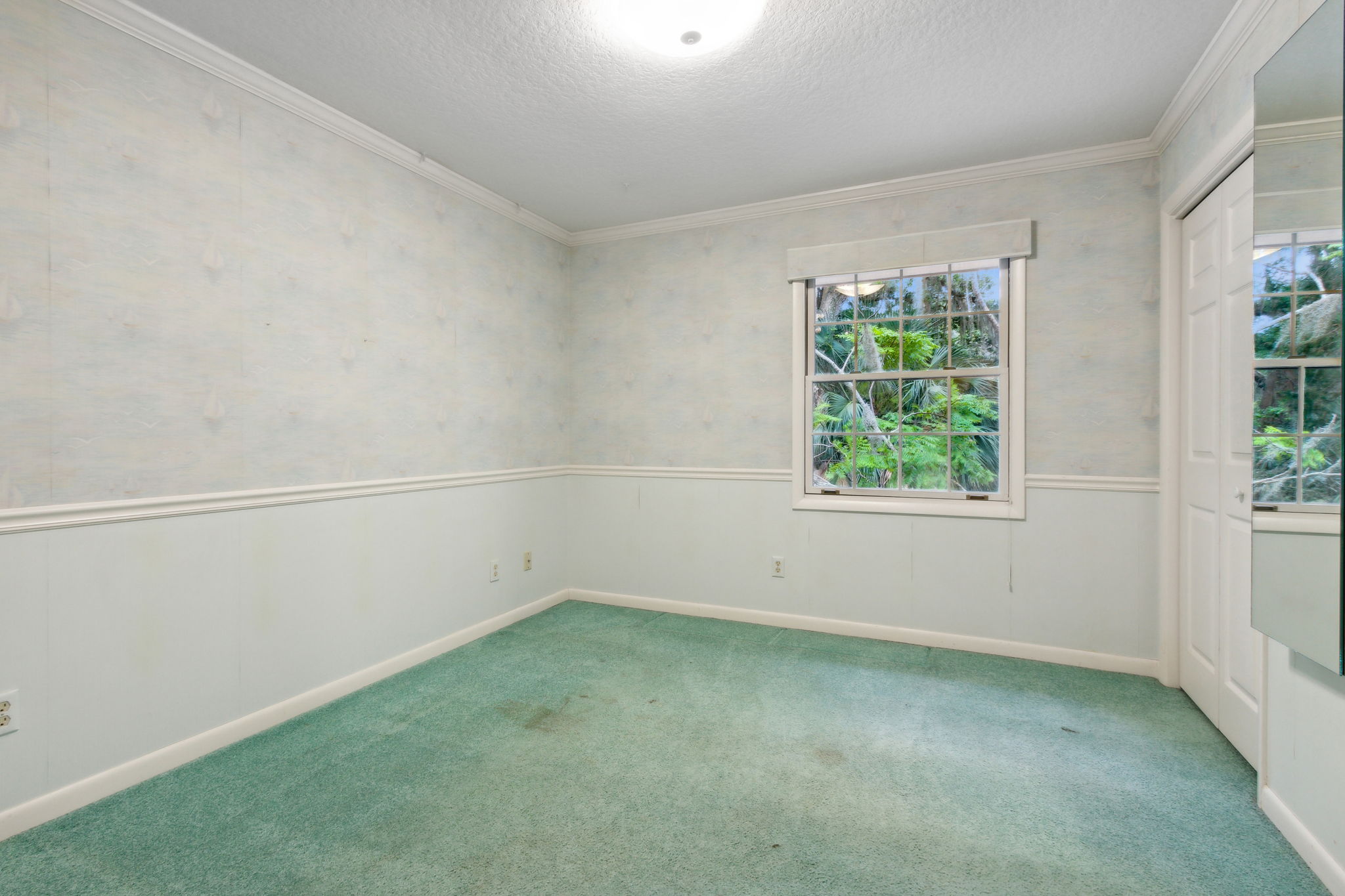 Bedroom 3 with crown and chair rail molding