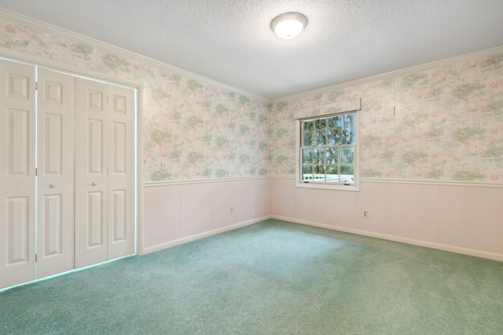 Bedroom 2 with crown and chair rail molding