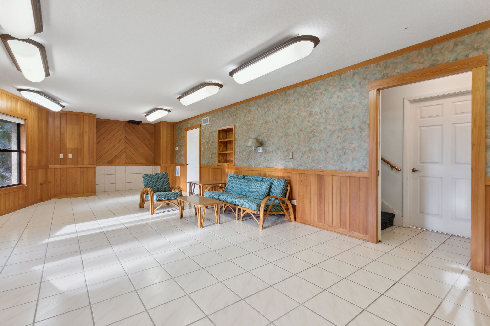 Flex room with storage area under the stairs