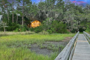 View of home nestled in the trees