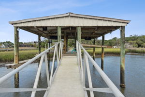 Looking up the aluminum ramp to the covered boat area from the floating dock