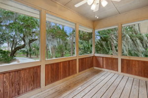 You'll feel "one with nature" in this Screened-in Porch off of Primary Bedroom