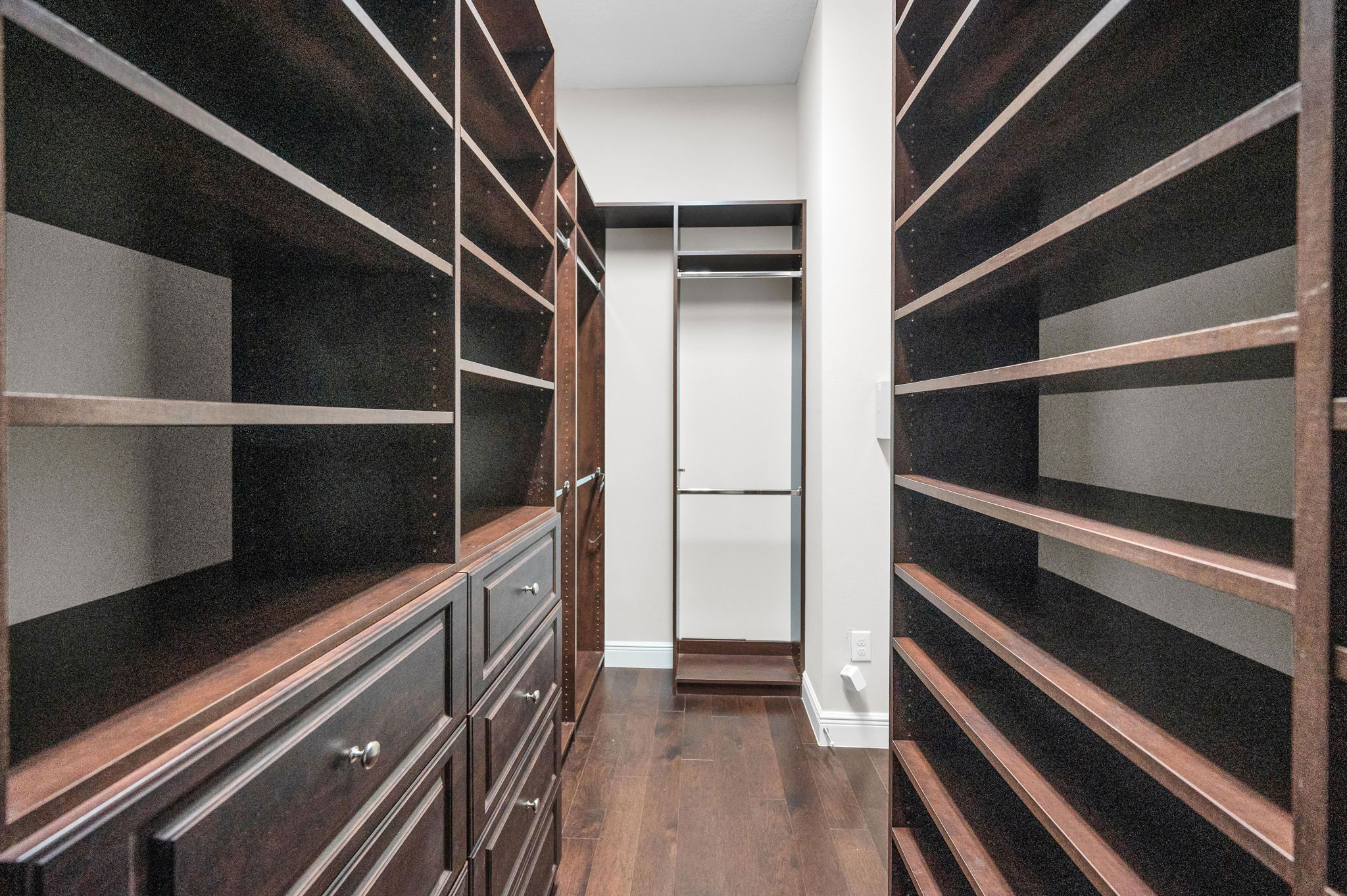 First Floor Primary Bedroom Walk-in Closet1b