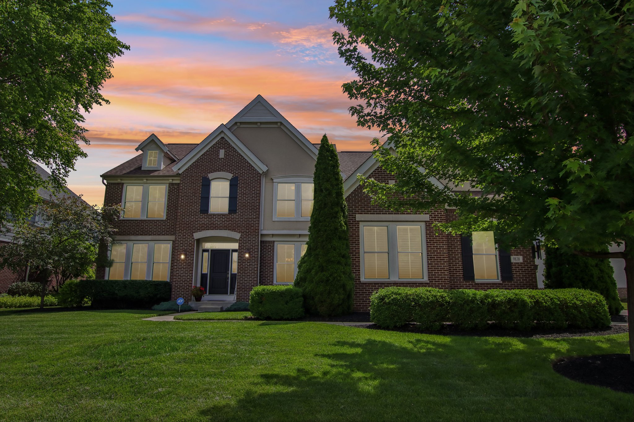 Twilight view of the front of the home