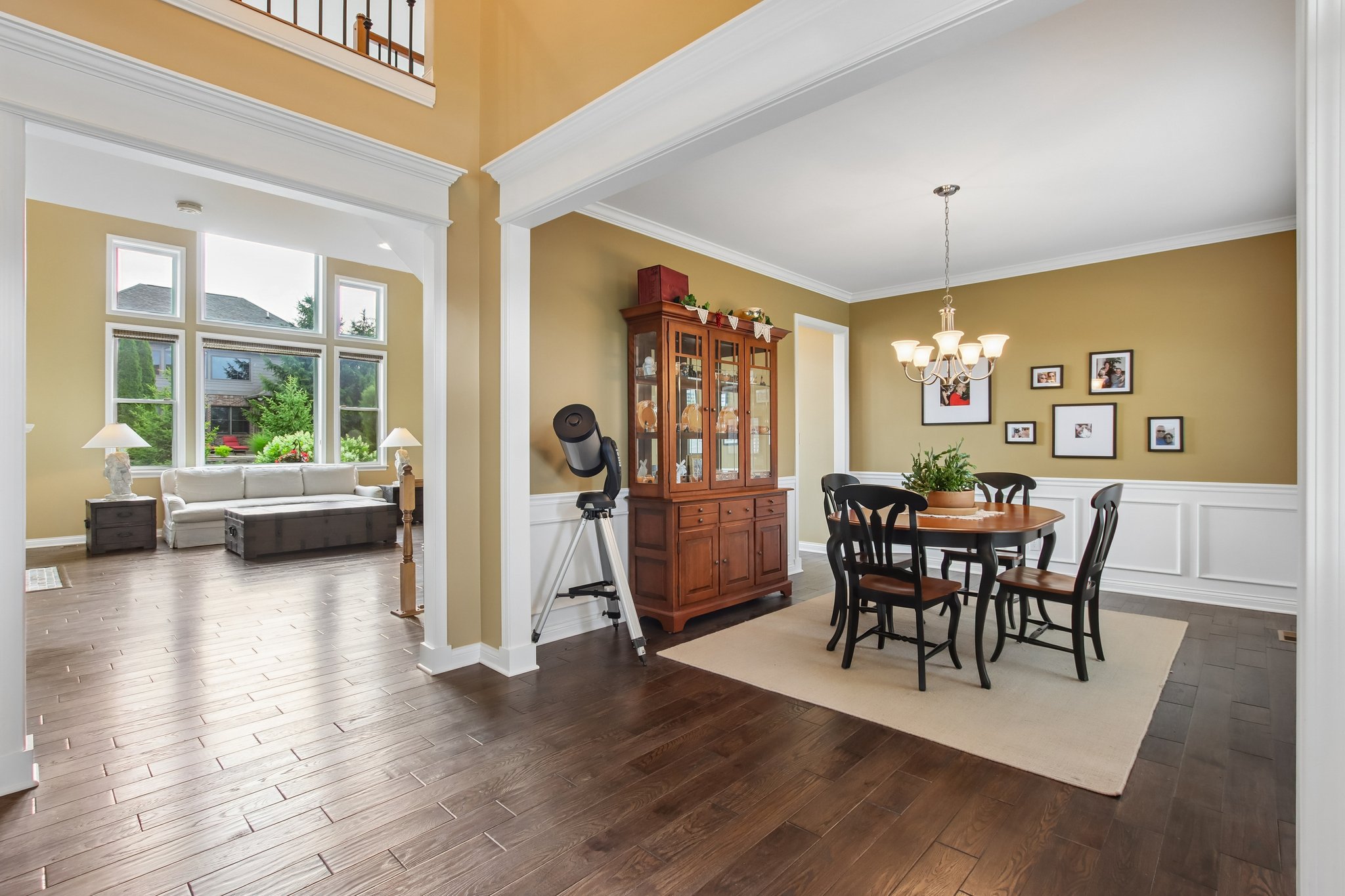 Dining Room with wainscotting and crown molding