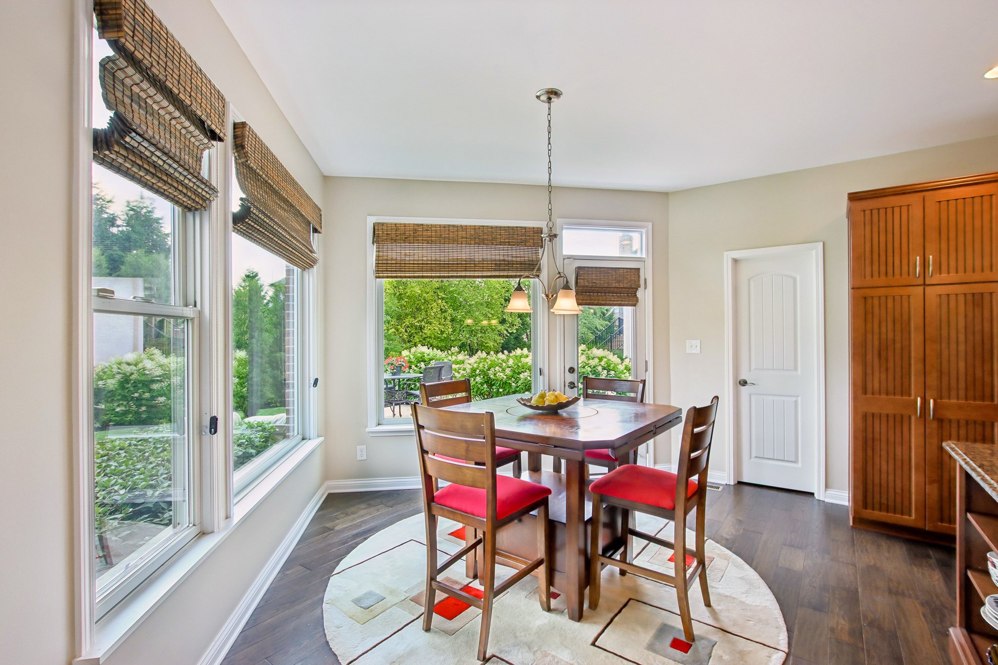 Breakfast Area offers windows overlooking large private outdoor entertaining area